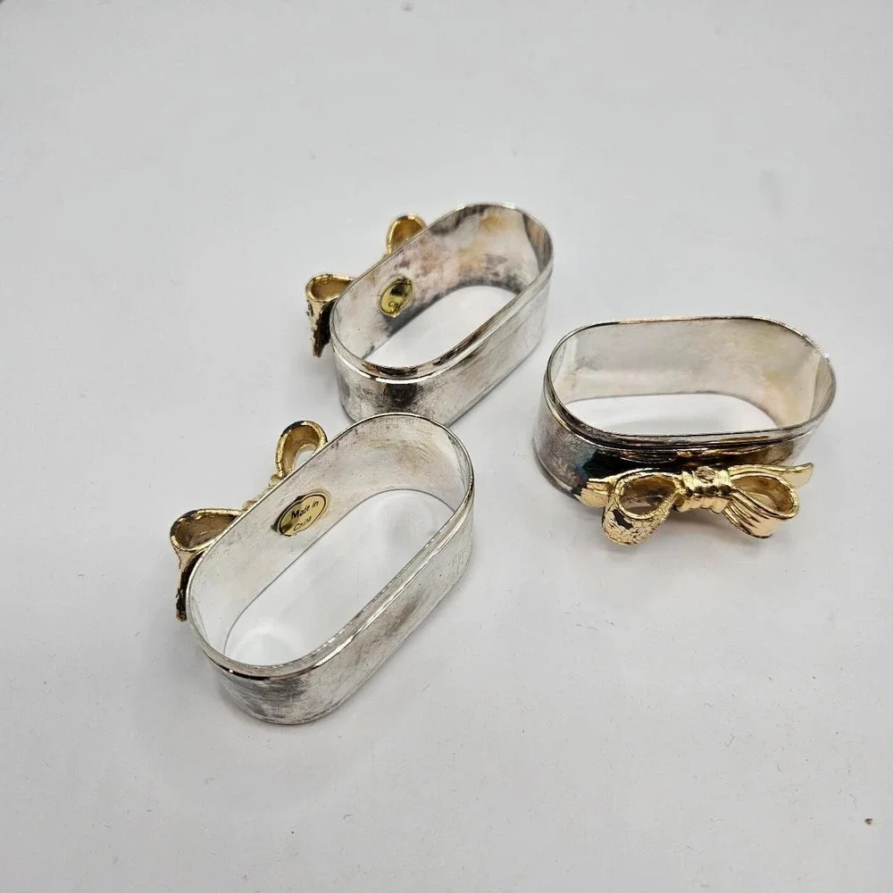 Set of 3 vintage silver bow tie napkin rings home, see photos for condition.
